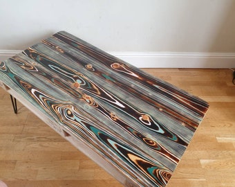 Reclaimed retro pallet coffee table 'evil eye' in urban farmhouse style, made with salvaged wood with industrial hairpin legs