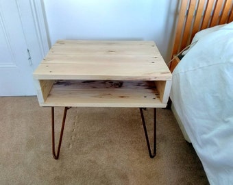 Reclaimed wood side table in rustic farmhouse style made with pallet wood with urban industrial style copper hairpin legs