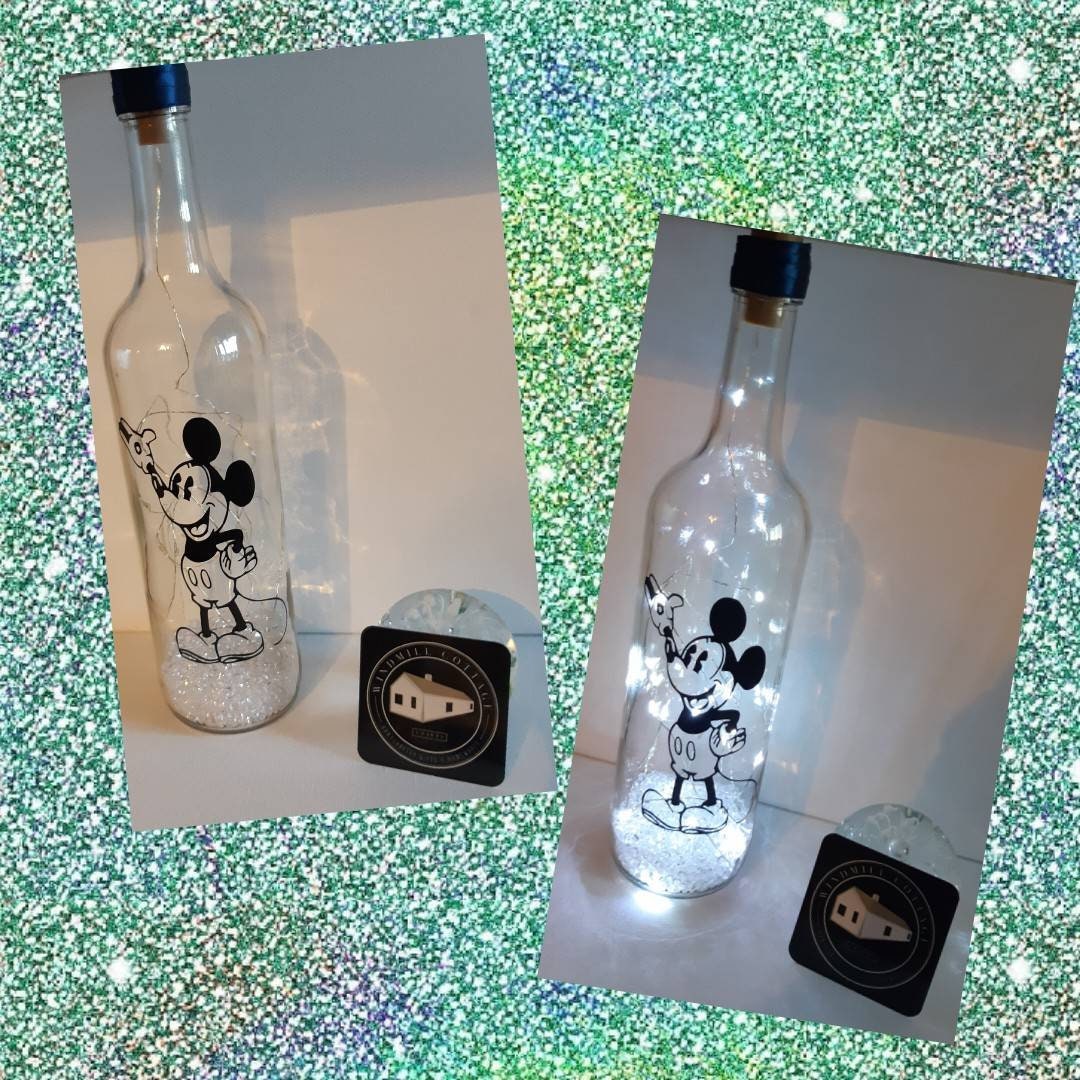 Inspirado en una botella iluminada de ratón. Lámpara, luz de noche.