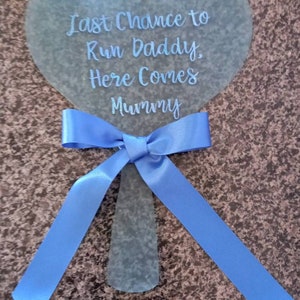 Lovely heart shaped wedding paddle for your page boy ring bearer to carry