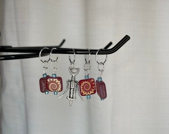 red with multi accent glass bead stitch marker set with wine bottle opener charm