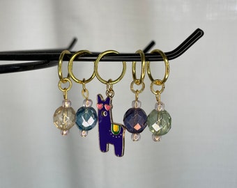 Multi colored faceted glass bead stitch marker set with purple llama enamel charm