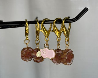 Brown and white marbled hibiscus flower glass bead locking stitch marker set with pink sheep enamel charm