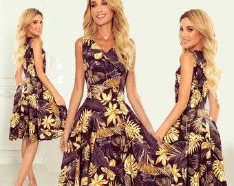 Flared dress in Black + golden leaves. High quality material.