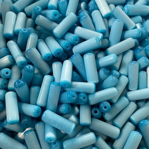 Pale Blue Tiger Glass Tubes. 40 beads.