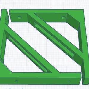May include: A bright green, 3D-printed bracket with a square frame and diagonal supports. The bracket has several holes and slots for mounting or securing other components. The design is geometric and angular.