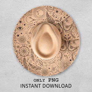 May include: A beige fedora hat with a wide brim, featuring intricate etched celestial and floral designs. The brim displays a sun, moon, stars, and a large moth. The text "ONLY PNG INSTANT DOWNLOAD" is at the bottom.