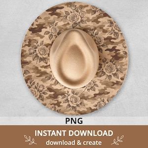 May include: A wide-brimmed hat featuring a tan crown and a brim decorated with a brown and tan camouflage pattern overlaid with detailed black line art illustrations of blooming roses and leafy stems throughout the design.