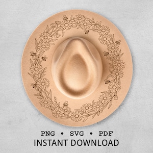 Può includere: Un cappello fedora beige con un design floreale e di api inciso sul bordo. Il cappello ha una corona arrotondata e un'ampia tesa. Il testo "INSTANT DOWNLOAD" è nella parte inferiore dell'immagine.