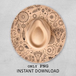 May include: A tan-colored wide-brimmed hat with a cream-colored crown. The brim is decorated with black illustrations of dream catchers, moons, stars, flowers, and a bull skull. The text "ONLY PNG INSTANT DOWNLOAD" is at the bottom.