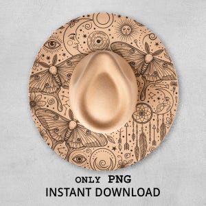 Può includere: Cappello fedora beige con tesa decorativa con un design celeste con falene, lune, occhi e stelle. Il testo "ONLY PNG INSTANT DOWNLOAD" è stampato nella parte inferiore dell'immagine.