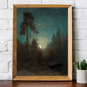 May include: A framed painting depicting a moonlit forest scene. The painting features a large tree in the foreground, with a full moon shining through the branches. The forest is dark and mysterious, with a sense of peace and tranquility.