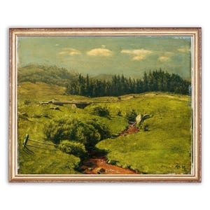May include: An antique landscape painting in a gold frame. The artwork depicts a green meadow with a stream, trees, and rolling hills under a cloudy sky. The painting has a vintage aesthetic, with visible brushstrokes and a warm color palette.