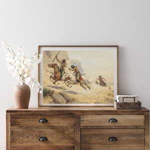 May include: A vintage illustration of three Native American men on horseback riding through a desert landscape. The men are wearing traditional clothing and carrying weapons. The horses are running at full speed, kicking up dust.