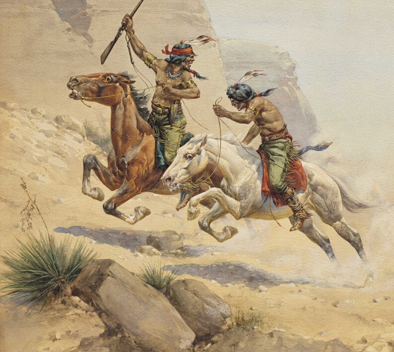 May include: Two Native American men on horseback riding through a desert landscape. The men are wearing traditional clothing and headdresses. The horses are running at full speed, with their manes and tails flowing in the wind.