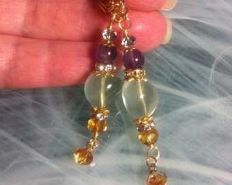 Victorian-style earrings featuring irregularly shaped beads of Fluorite, Amethyst, and Czech glass crystals in honey and blue
