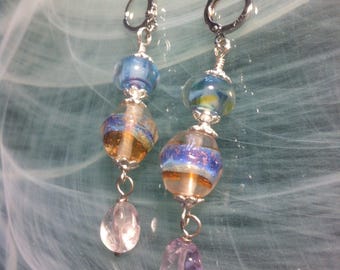 Earrings featuring a large Murano glass bicone bead, handmade in Venice, topped with another Murano glass bead and a dangling ametrine
