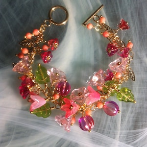 Czech glass flower and leaf bead bracelet on a large rectangular link chain with a 14K gold-plated T-bar clasp