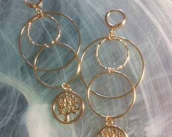 New Age earrings in circles of different diameters with two hanging tree of life charms plated in 14K Gold