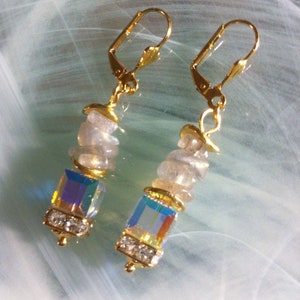Earrings with Labradorite pebbles in wavy gold-plated discs, on two large squares of clear Swarovski Aurora Borealis crystal