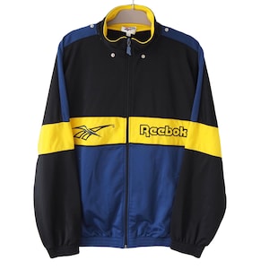 Vintage REEBOK Track Jacket Full Zip Size L/XL 90s big logo windbreaker sport style