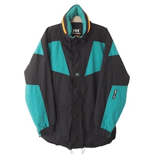 Vintage HELLY HANSEN Jacket Size L ski style blue black outdoor 90s trekking mountains parka