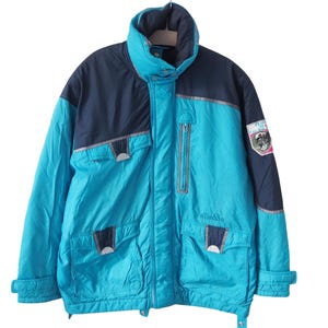 veste de ski vintage ELLESSE taille L/XL en plein air montagnes des années 90 style à capuche bleu