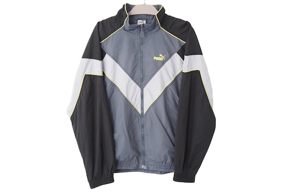 【70〜80s】vintage PUMA track jacket 西ドイツ製 Vintage Puma Red Track Jacket With Contrasting Blue Details