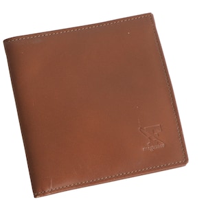 Portefeuille vintage Courrèges en cuir marron des années 90, support rétro pour accessoires de luxe
