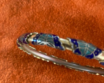 Vintage enamel bangle with butterfly design.