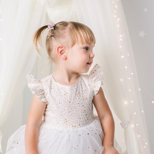 white mesh dress with gold stars Confte