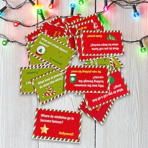 24 Christmas Jokes for festive fun, Crackers, Table Talkers, Loot, Games, Elf and so much more!