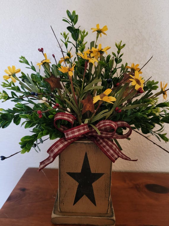 Country/Primitive wood arrangement with boxwood daisies, rusty stars, pip berries for your primitive decor.  Primitive wood gift.