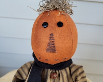 Pumpkin doll for your country primitive fall decor.  Primitive fall gift.  Autumn pumpkin doll.  Rustic pumpkin doll.  Country pumpkin doll.