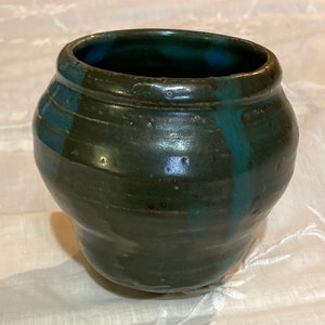 Green pottery vase