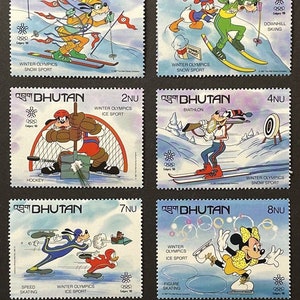Olimpiada w Calgary 1988 Disney Bhutan kompletny zestaw 8 indywidualnych znaczków i 2 arkuszy pamiątkowych Scott #631-40 MNH postacie w wydarzeniach