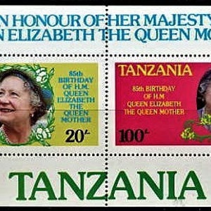 May include: Two postage stamps from Tanzania commemorating Queen Elizabeth, the Queen Mother. The stamps feature a portrait of the Queen Mother and the text "85th Birthday of HM Queen Elizabeth The Queen Mother". The stamps are red and yellow with a green border.