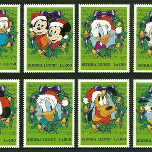 Sierra Leone 1997-8 Disney Christmas 2 Mini arkusze i pamiątkowe 1 zestaw nadruków i zestaw 8 znaczków Scott #2069-79//2117-9 MNH 70. urodziny Myszki Miki