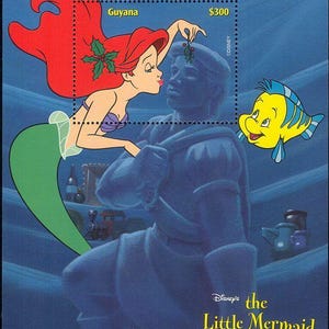Disney Gujana 1999 Zestaw 4 Pamiątkowych Arkuszy Scott #3377 -80 MNH kreskówki filmowe z pociągami 101 Dalmatyńczyków - Robin Hood - Mała Syrenka
