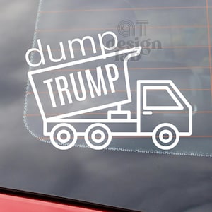 May include: A white vinyl decal sticker applied to a vehicle window. The design features a line-art illustration of a dump truck with the word dump written above the truck bed and the word TRUMP written inside the truck bed in white text.