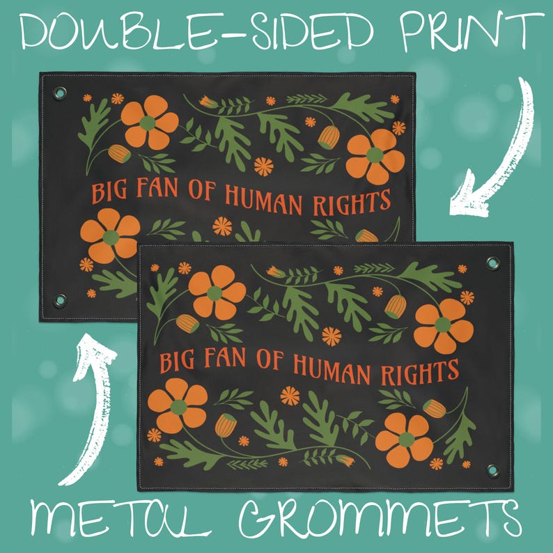 Close-up graphic showing the “Big Fan of Human Rights” house flag with a double-sided print. Two views of the same flag are shown to demonstrate that the floral folk design and text appear clearly on both sides. The flag features a black background with orange flowers and green leafy motifs, reinforced stitching, and metal grommets in the corners for secure hanging on a flagpole or outdoor display.