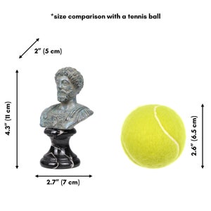 May include: A bronze bust sculpture of a man with a beard, on a black marble base. The bust is 4.3 inches tall and 2 inches wide. The sculpture is shown next to a yellow tennis ball, which is 2.6 inches in diameter. *size comparison with a tennis ball*