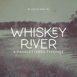 May include: A vintage-style graphic with the words "Whiskey River" in white, hand-lettered font. The background features a muted landscape with trees and water, and the text "A Handlettered Typeface" is below.