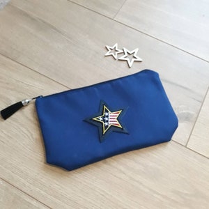 Blue pocket, with leather star and crest, military style