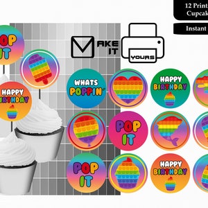 May include: A collection of 12 printable 2-inch cupcake toppers with colorful designs. The toppers feature the words "POP IT", "HAPPY BIRTHDAY", and "WHATS POPPIN" with various pop-it toy designs. The image also includes text that says "Instant download".