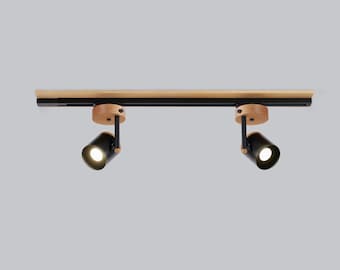 Iluminación de riel de madera negra
