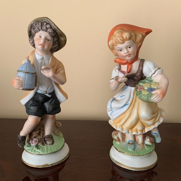 Ceramic Colonial  Figurines with  Baskets 7”
