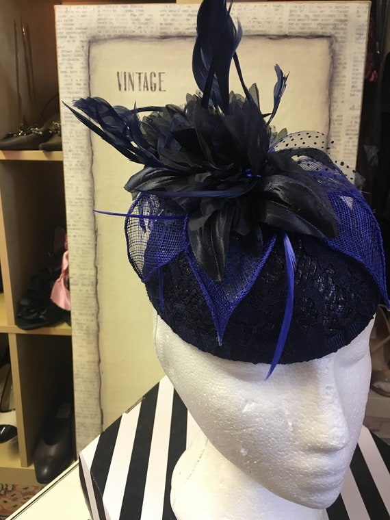 Vintage bespoke hat with blue feather