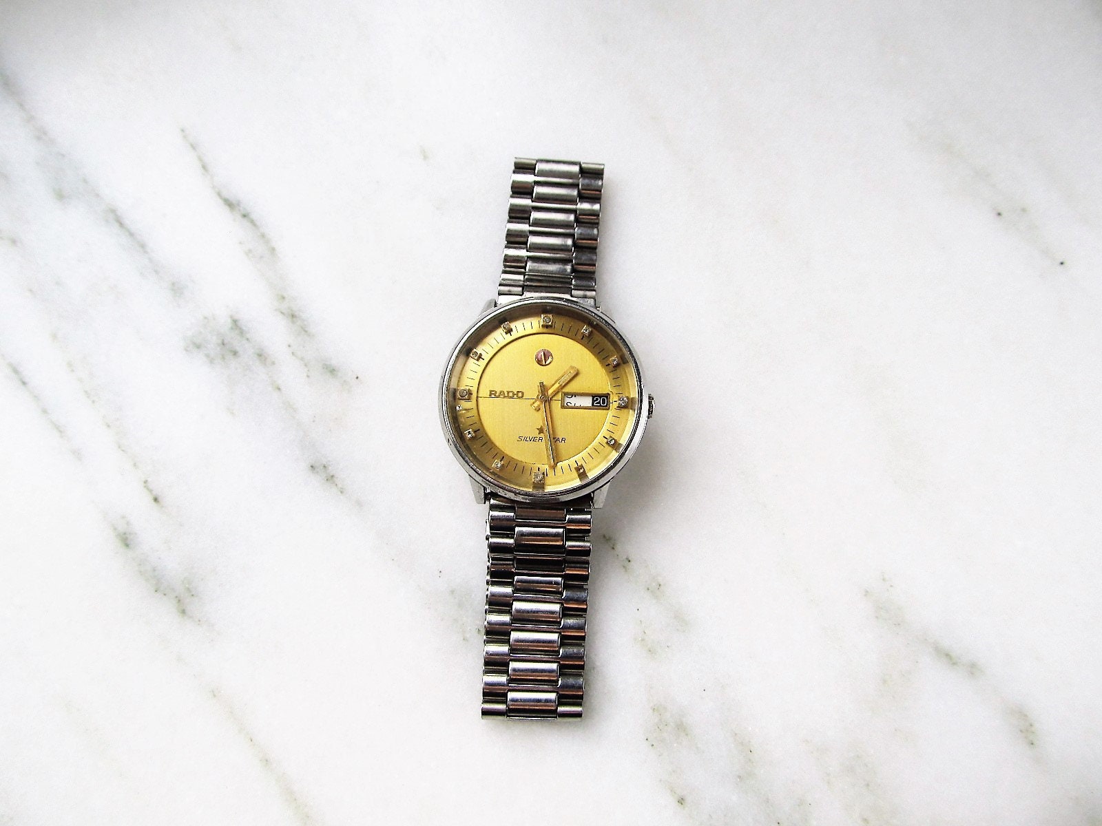 rado silver watch