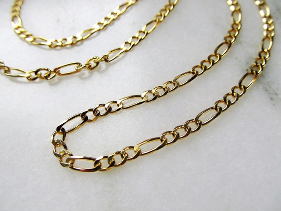 Gold over silver figaro chain outlet